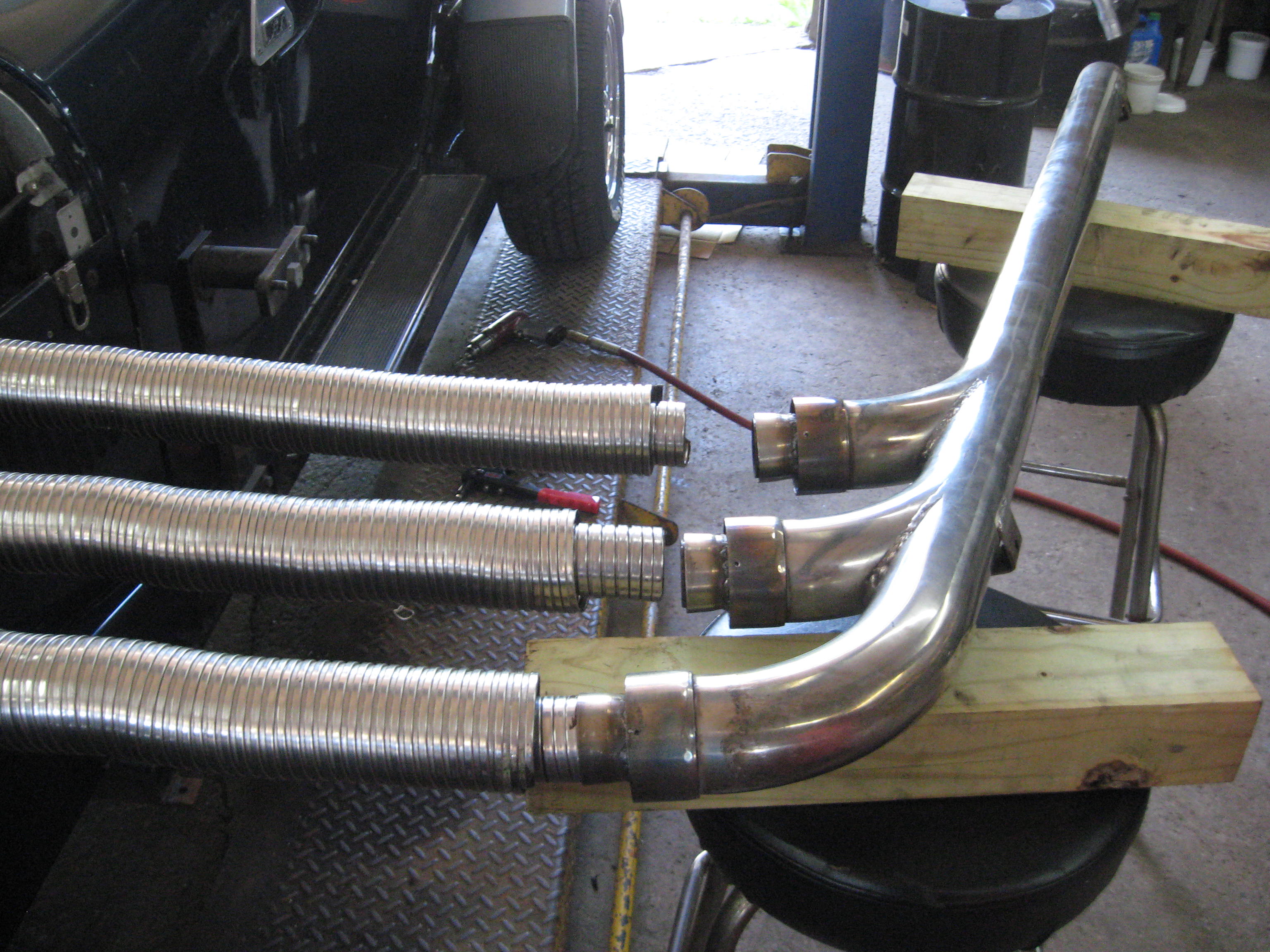 Automotive Exhaust Specialists work